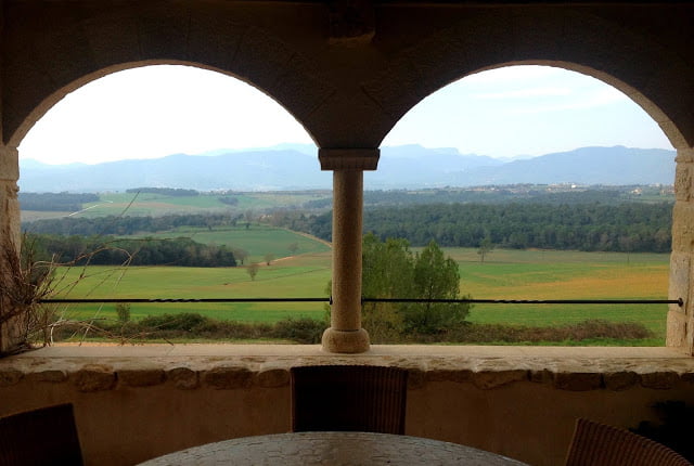 A balcony with sweeping views of the mountains