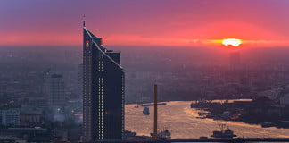 The Chao Phraya River and the city it flows through in the sunset