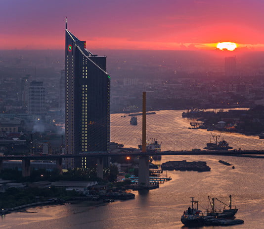 The Chao Phraya River and the city it flows through in the sunset