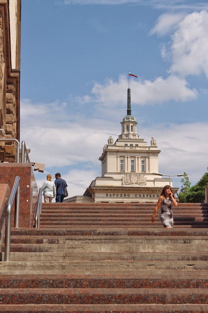 a woman walking down the stairs