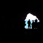 Tourists exploring the cave