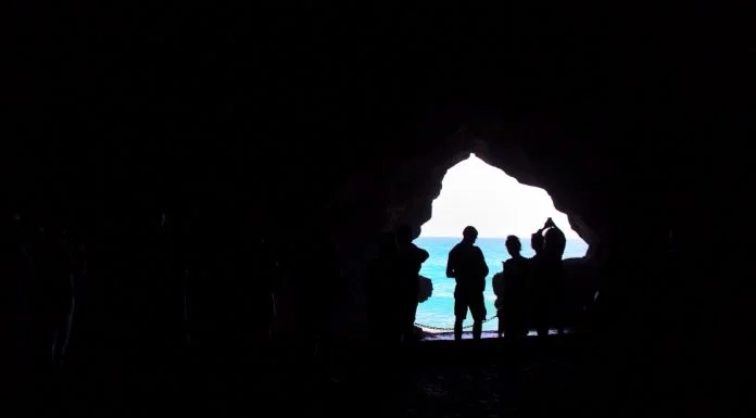 Tourists exploring the cave