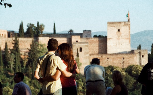 Lovers gazing at Alhambra Palace